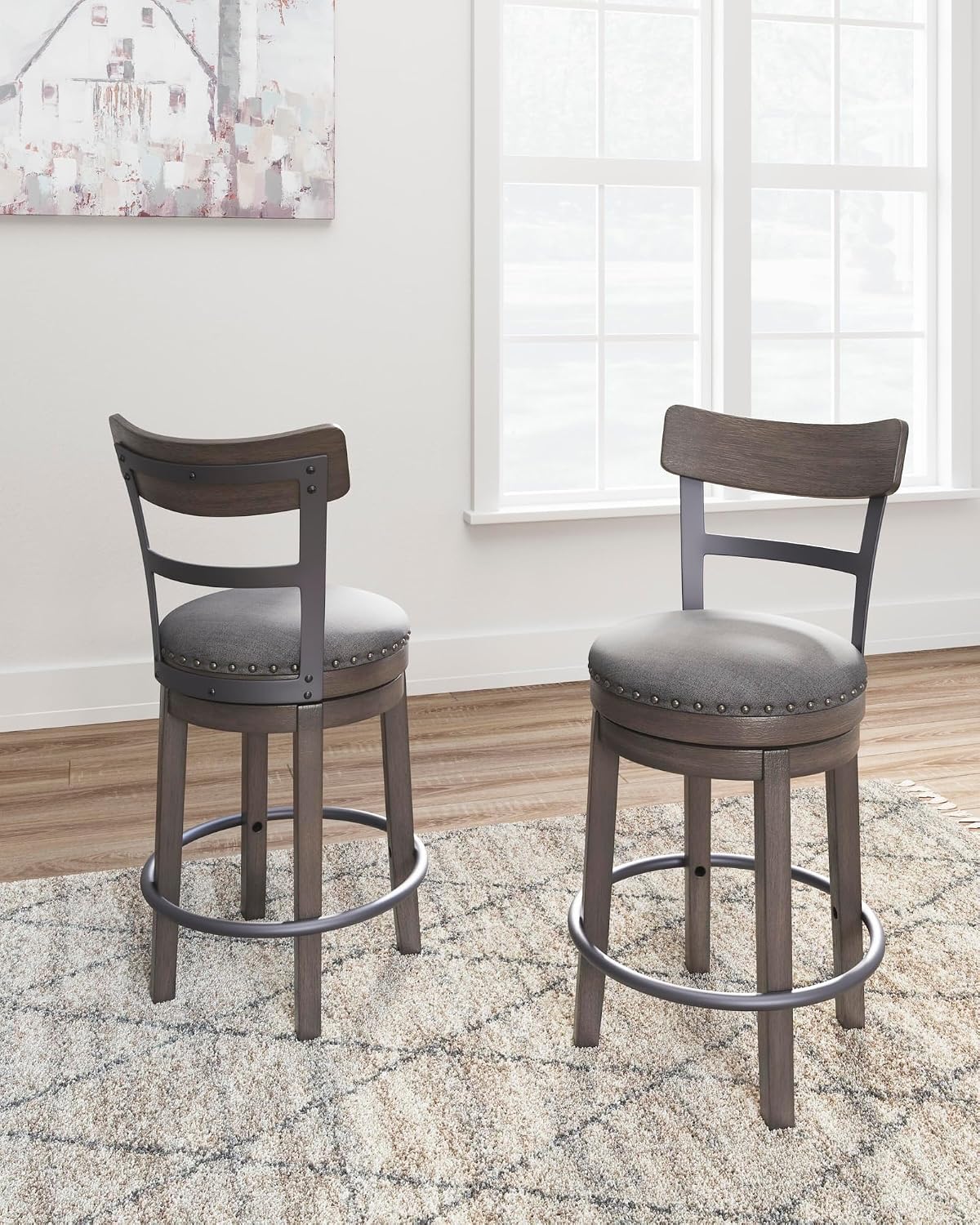 Signature Design by Ashley 1-Piece Swivel Counter Height Bar Stool, Gray | 24-inch seat height, Solid wood base, Metal back supports, Easy-clean polyester upholstery, Nailhead trim, Caitbrook Series