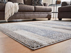Signature Design by Ashley Sethburn Striped Area Rug 5x7, Cream/Gray | Machine-woven 100% polypropylene, Natural jute backing, Casual modern style, Indoor living spaces, Bedrooms
