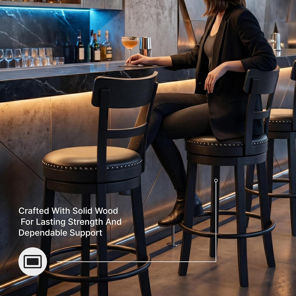 Signature Design by Ashley 30" Swivel Bar Height Bar Stool, Antiqued Black | Solid wood and metal frame, Easy-clean black faux leather seat with 360 swivel, Valebeck Series