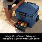 Ninja FrostVault 30qt Cooler with Wheels, Dry Storage, Lakeshore Blue | Ninja FrostVault's 30-qt capacity holds 48 cans, keeps food cool & dry, and rolls easily on all-terrain wheels