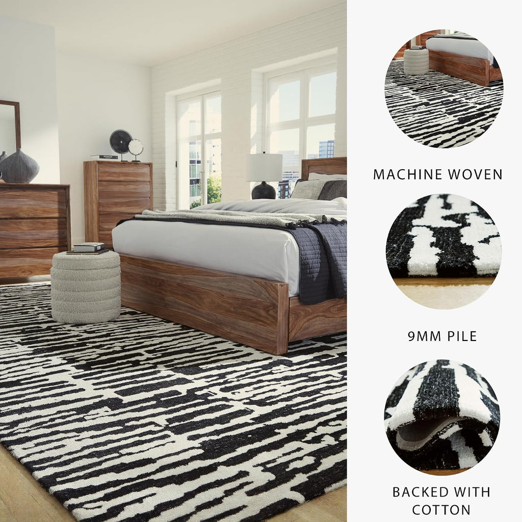 Signature Design by Ashley Area Rug, Abstract 10x14, Black/Ivory | Extra large modern abstract rug with medium 9 mm pile, 100% polyester for spacious living rooms, Bramshaw Series