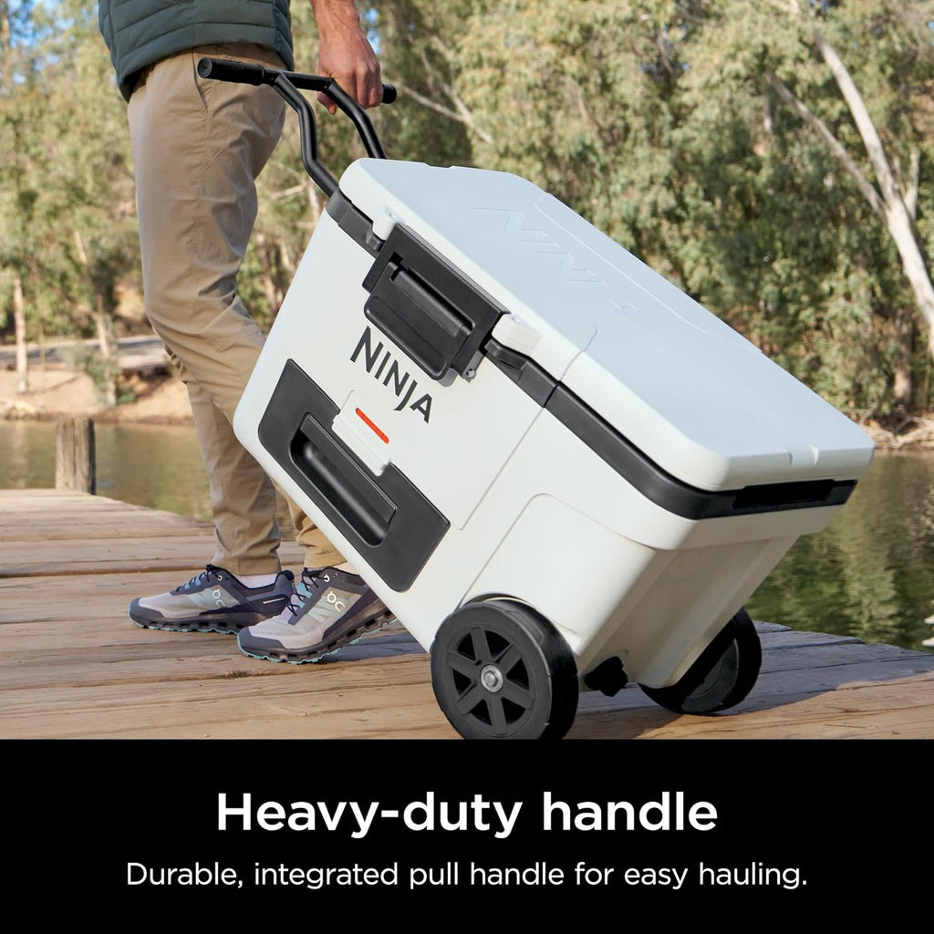 Ninja FrostVault™ 45qt Cooler with Wheels, Dry Storage Drawer, White | Ninja FrostVault's 45-qt capacity holds 68 cans, keeps food cool & dry, and rolls easily on all-terrain wheels