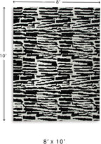 Signature Design by Ashley Bramshaw Area Rug, 8x10, Black and Ivory | Plush 9 mm medium-pile polyester, Protective woven cotton backing, Contemporary high-contrast pattern