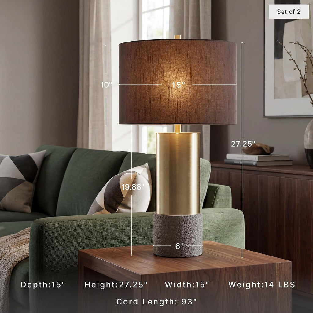 Signature Design by Ashley Jacek Contemporary Table Lamp Set of 2 | Textured faux concrete and brass-finished metal, Black drum shade with goldtone foil interior, Living room and bedside use