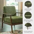 Signature Design by Ashley Bixler Showood Accent Chair, Olive Green | Plush chenille blend upholstery, Reversible cushion, Exposed engineered wood frame, Cozy reading nook, Wood accent chair