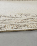 Signature Design by Ashley 8x10 Hand Tufted Wool and Jute Rug, Taupe | Premium 96% wool area rug, 4% jute blend with 10 mm pile, Bordered transitional style for living rooms, Idaman Series