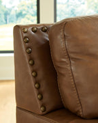Signature Design by Ashley Oversized Brown Leather Accent Chair, Amber | Genuine and faux leather with brass-tone nailhead trim, Faux wood base, No assembly living room chairs, Brendola Series