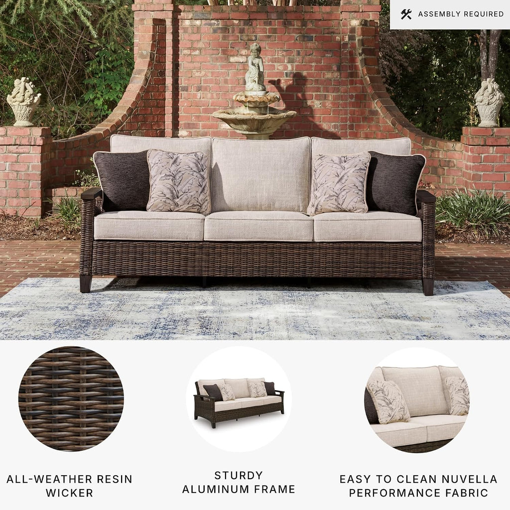 Signature Design by Ashley Drakes Beach 3-Seat Outdoor Sofa, Brown Wicker | Sturdy aluminum frame, Woven-look dark brown resin wicker, Bleach cleanable Nuvella fabric, 4 throw pillows included
