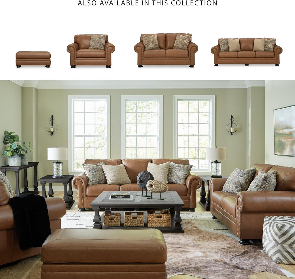 Signature Design by Ashley Carianna Oversized Leather Accent Chair, Caramel | Top-grain leather seating, Durable faux leather outer panels, Extra-wide 54 in frame, Traditional living room style