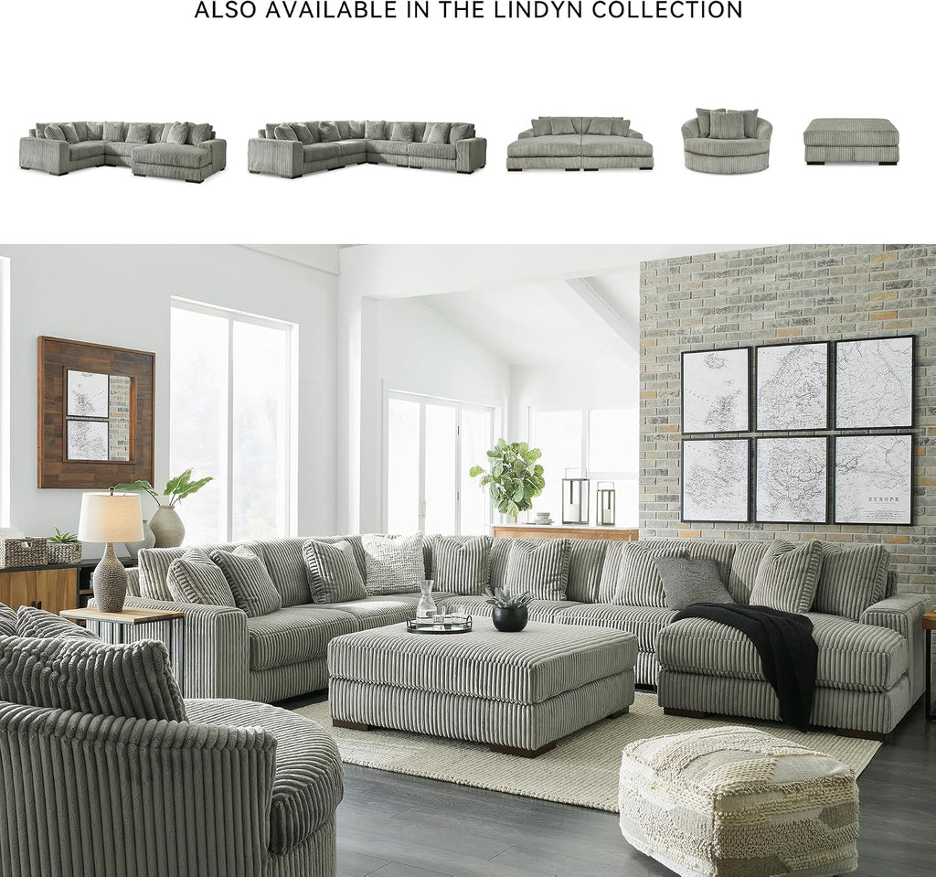 Signature Design by Ashley Lindyn Oversized Round Swivel Accent Chair, Fog | Plush textured cord upholstery, Sag-resistant platform foundation, Reversible seat cushion, No assembly required