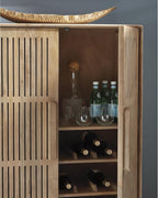 Signature Design by Ashley Solid Mango & Engineered Wood Bar Cabinet | Solid mango wood liquor cabinet, Built-in bottle and stemware racks, Minor assembly for lounges, Pellamour Series