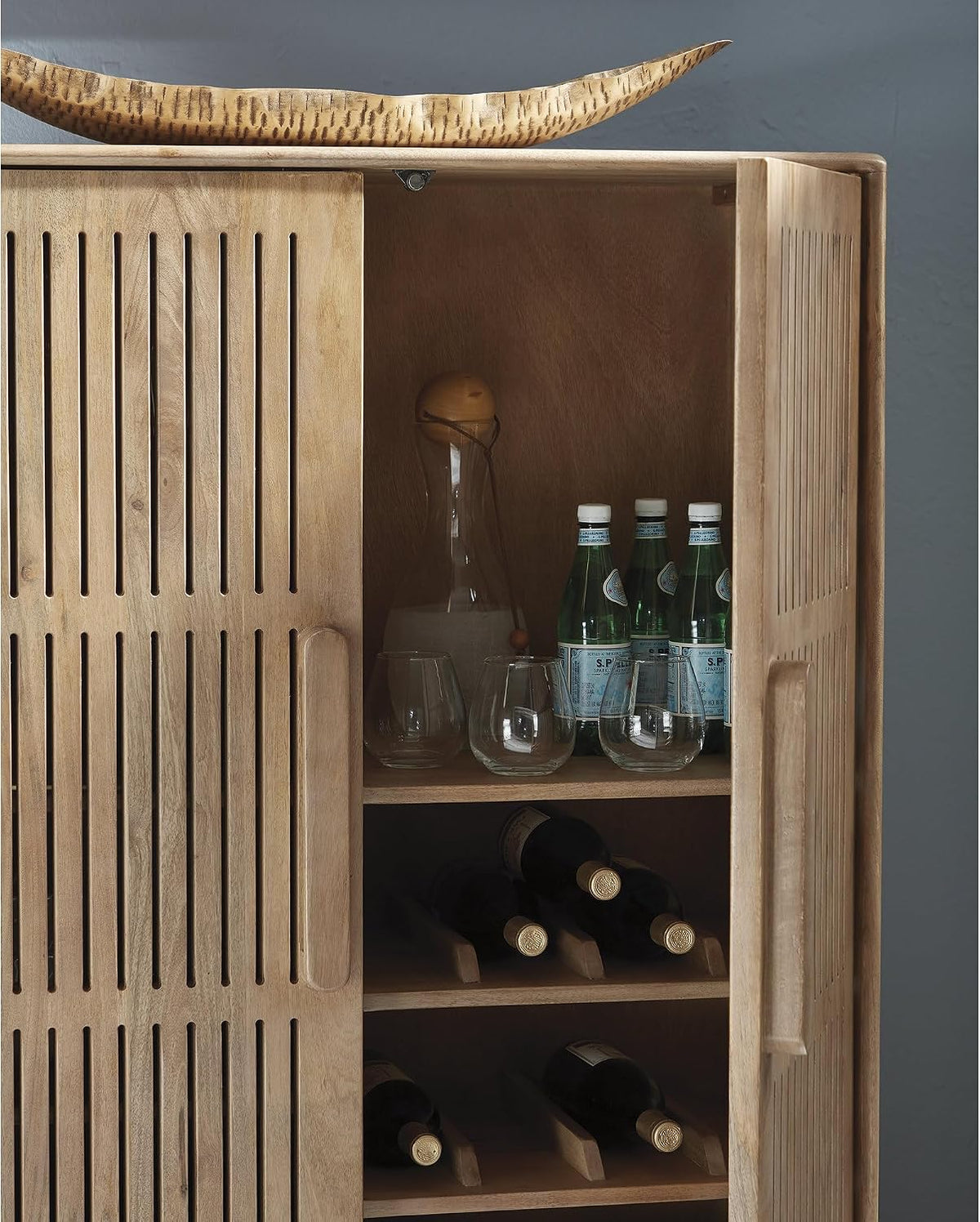 Signature Design by Ashley Solid Mango & Engineered Wood Bar Cabinet | Solid mango wood liquor cabinet, Built-in bottle and stemware racks, Minor assembly for lounges, Pellamour Series