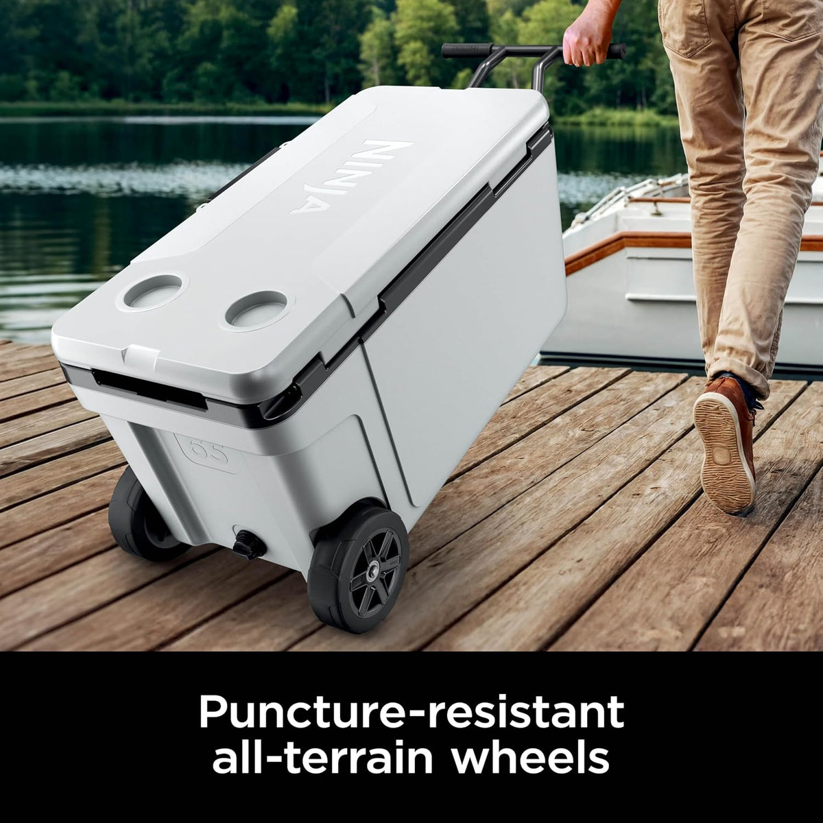 Ninja FrostVault™ 65qt Cooler with Wheels, Dry Storage, Spanish Moss | Ninja FrostVault's 65-qt capacity holds 97 cans, keeps food cool & dry, and rolls easily on all-terrain wheels