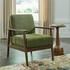 Signature Design by Ashley Bixler Showood Accent Chair, Olive Green | Plush chenille blend upholstery, Reversible cushion, Exposed engineered wood frame, Cozy reading nook, Wood accent chair