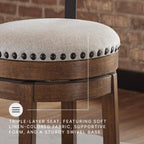 Signature Design by Ashley Valebeck Counter Height Bar Stool, Brown | Rustic-industrial wood and metal stool, Cushioned comfort, Tailored nailhead trim, Smooth 360-degree swivel