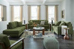 Signature Design by Ashley Bixler Showood Accent Chair, Olive Green | Plush chenille blend upholstery, Reversible cushion, Exposed engineered wood frame, Cozy reading nook, Wood accent chair