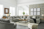 Signature Design by Ashley Lindyn Oversized Round Swivel Accent Chair, Fog | Plush textured cord upholstery, Sag-resistant platform foundation, Reversible seat cushion, No assembly required