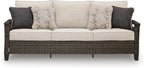 Signature Design by Ashley Drakes Beach 3-Seat Outdoor Sofa, Brown Wicker | Sturdy aluminum frame, Woven-look dark brown resin wicker, Bleach cleanable Nuvella fabric, 4 throw pillows included
