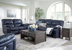 Signature Design by Ashley Leesworth Power Reclining Loveseat, Ocean Blue | Space-saving zero wall design, Top grain leather touchpoints, Built-in zero-draw USB ports, 32 in minimum doorway width