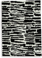 Signature Design by Ashley Bramshaw Area Rug, 5x7, Black and White | Soft 9 mm pile for underfoot comfort, High-contrast abstract pattern, Durable machine-woven polyester