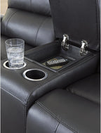 Signature Design by Ashley Leather Reclining Loveseat with Console, Black | Combination of leather and faux leather, Dual manual pull-tabs, Integrated center storage, Glassmere Series