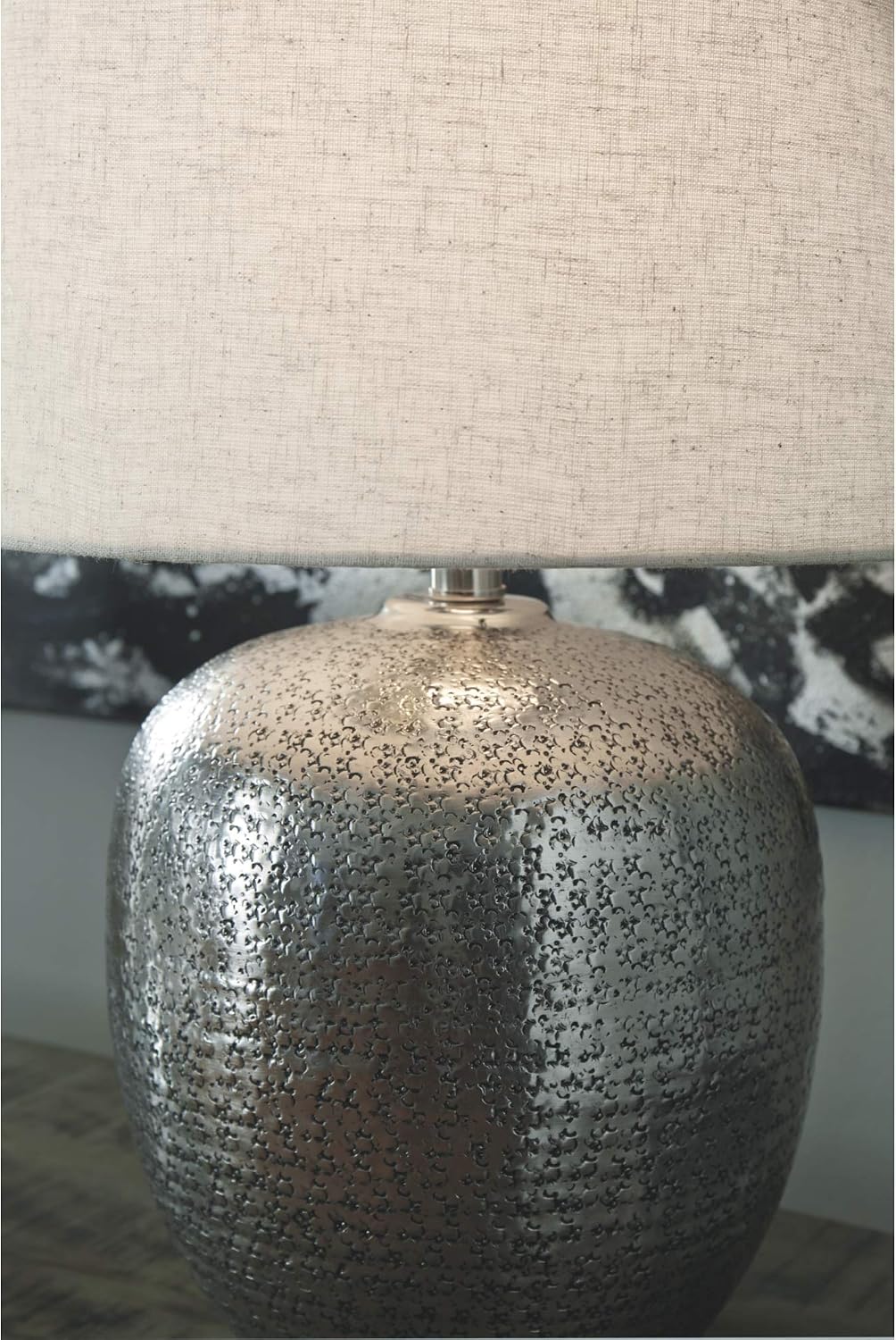 Signature Design by Ashley Magalie Metal Table Lamp, Antiqued Silver | Textured hammered aluminum base, Vintage warmth, Crisp modified drum shade, Cozy living room lighting