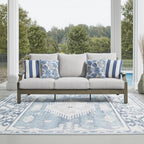 Signature Design by Ashley Rainier Ranch 3-Seat Outdoor Sofa, Beige | Rust-resistant wood-look aluminum frame, UV-resistant Nuvella+ cushions, 3-seat casual contemporary patio sofa