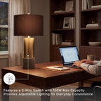 Signature Design by Ashley Jacek Contemporary Table Lamp Set of 2 | Textured faux concrete and brass-finished metal, Black drum shade with goldtone foil interior, Living room and bedside use