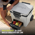 Ninja FrostVault™ 30qt Cooler with Wheels, Dry Storage, Spanish Moss | Ninja FrostVault's 30-qt capacity holds 48 cans, keeps food cool & dry, and rolls easily on all-terrain wheels