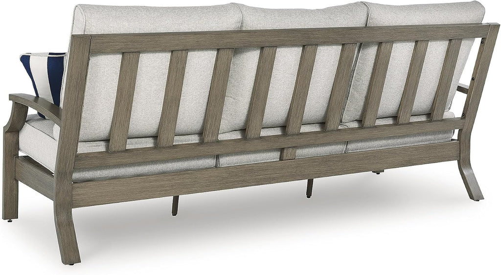 Signature Design by Ashley Rainier Ranch 3-Seat Outdoor Sofa, Beige | Rust-resistant wood-look aluminum frame, UV-resistant Nuvella+ cushions, 3-seat casual contemporary patio sofa