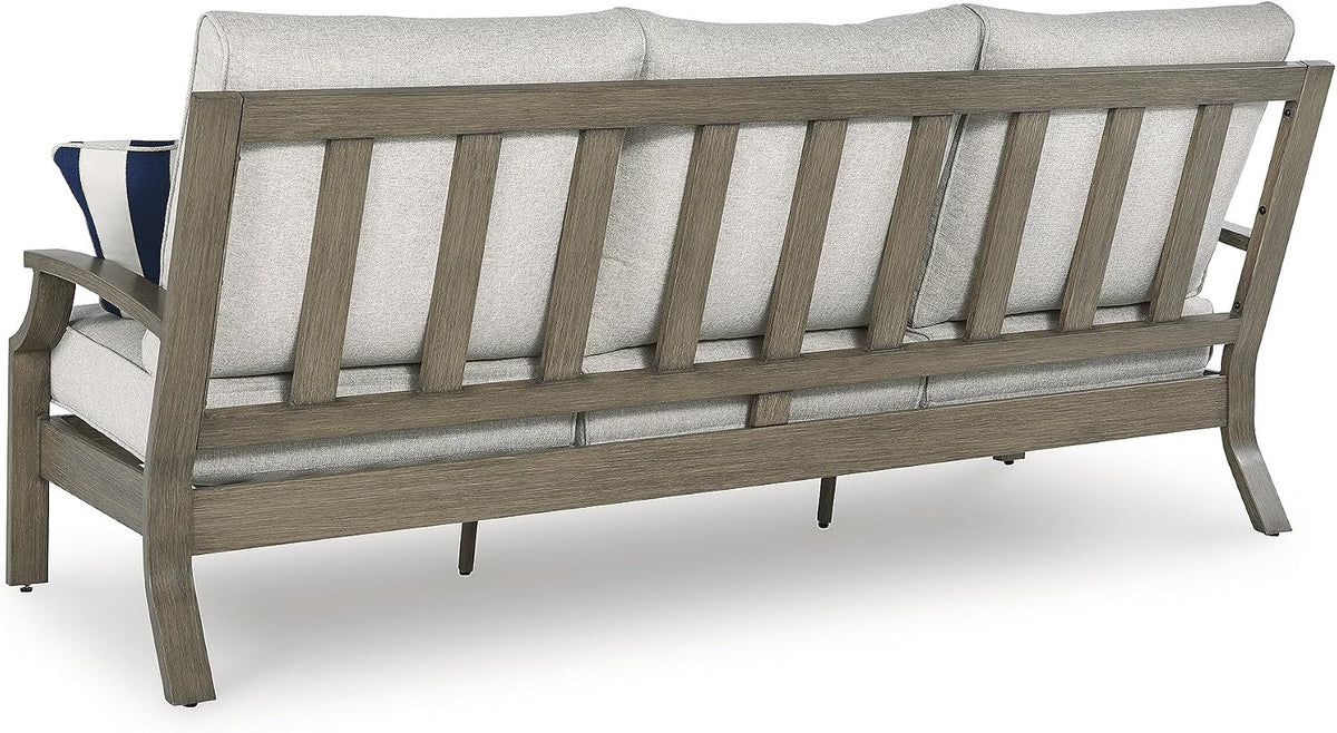 Signature Design by Ashley Rainier Ranch 3-Seat Outdoor Sofa, Beige | Rust-resistant wood-look aluminum frame, UV-resistant Nuvella+ cushions, 3-seat casual contemporary patio sofa