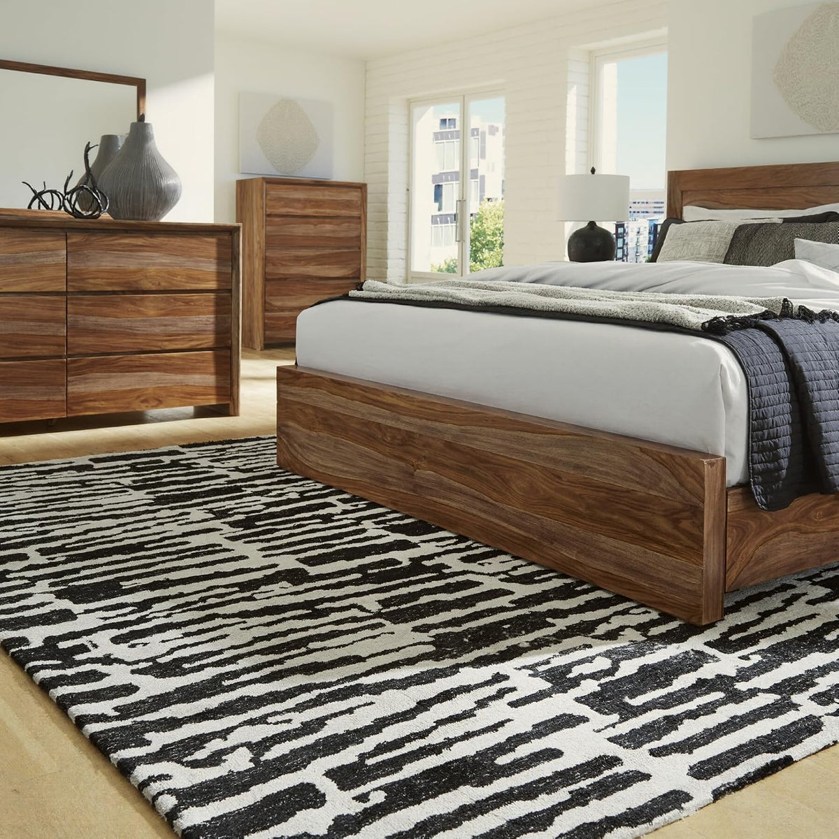 Signature Design by Ashley Bramshaw Area Rug, 8x10, Black and Ivory | Plush 9 mm medium-pile polyester, Protective woven cotton backing, Contemporary high-contrast pattern