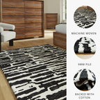Signature Design by Ashley Bramshaw Area Rug, 5x7, Black and White | Soft 9 mm pile for underfoot comfort, High-contrast abstract pattern, Durable machine-woven polyester