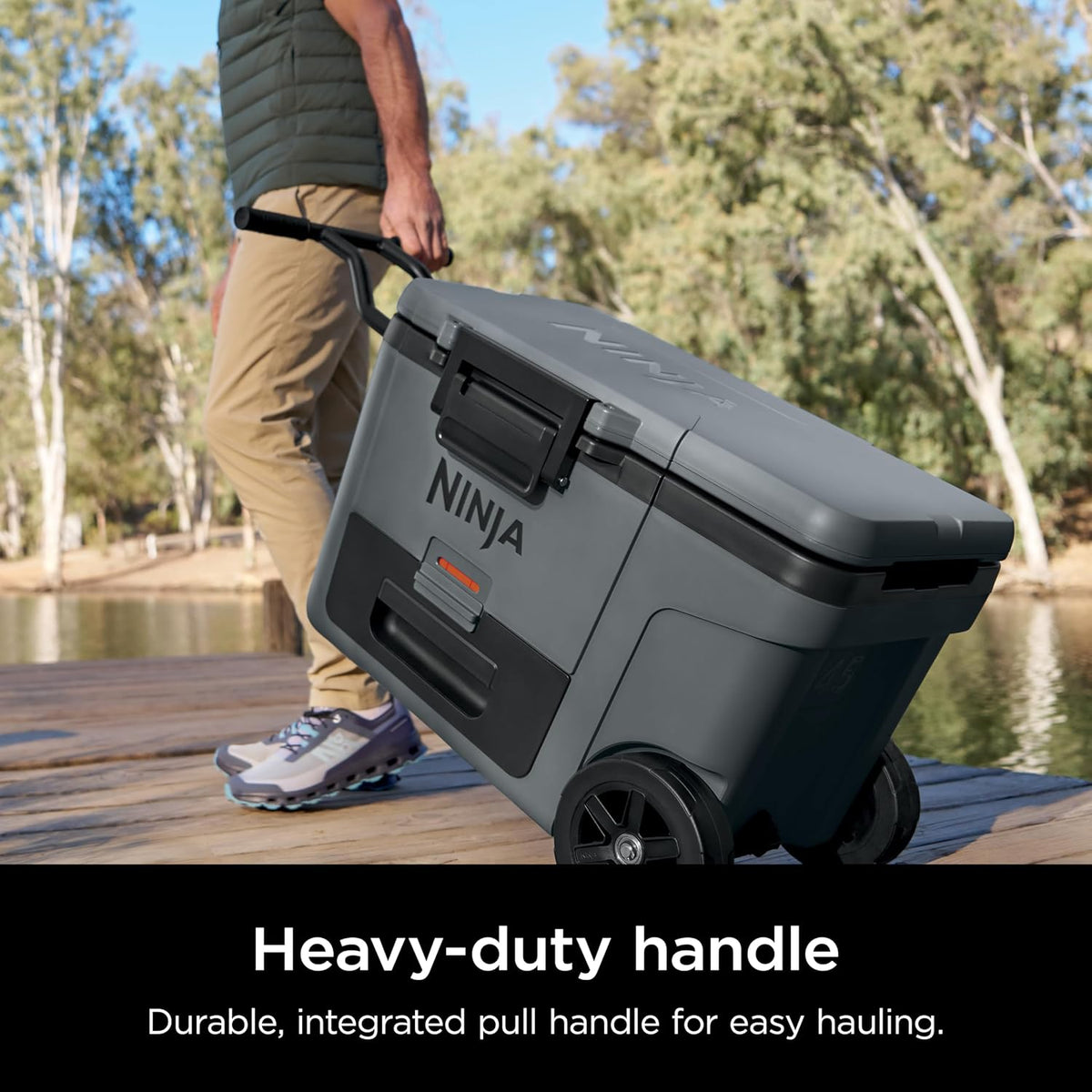 Ninja FrostVault™ 45qt Cooler with Wheels, Dry Storage, Charcoal Gray | Ninja FrostVault's 45-qt capacity holds 68 cans, keeps food cool & dry, and rolls easily on all-terrain wheels
