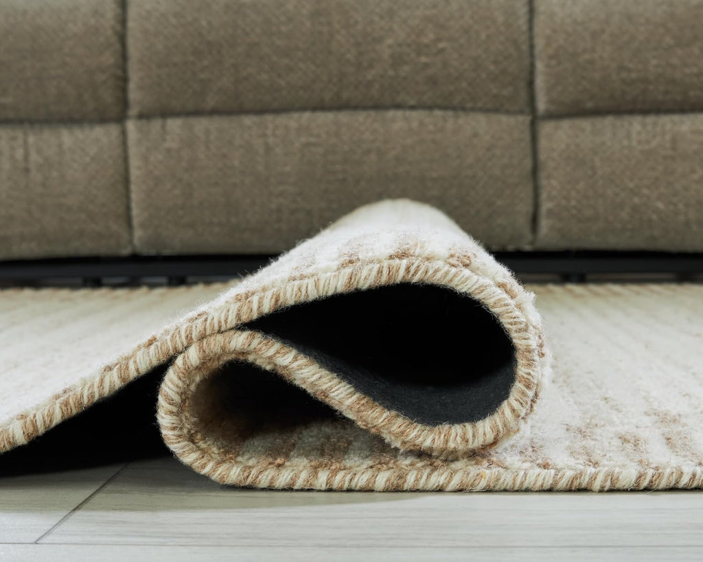 Signature Design by Ashley Wool Area Rug, Extra Large 10x14, Brown/Beige | 100% natural wool tufted construction, Modern stepped border in brown and beige, Oversized footprint, Emorymore Series