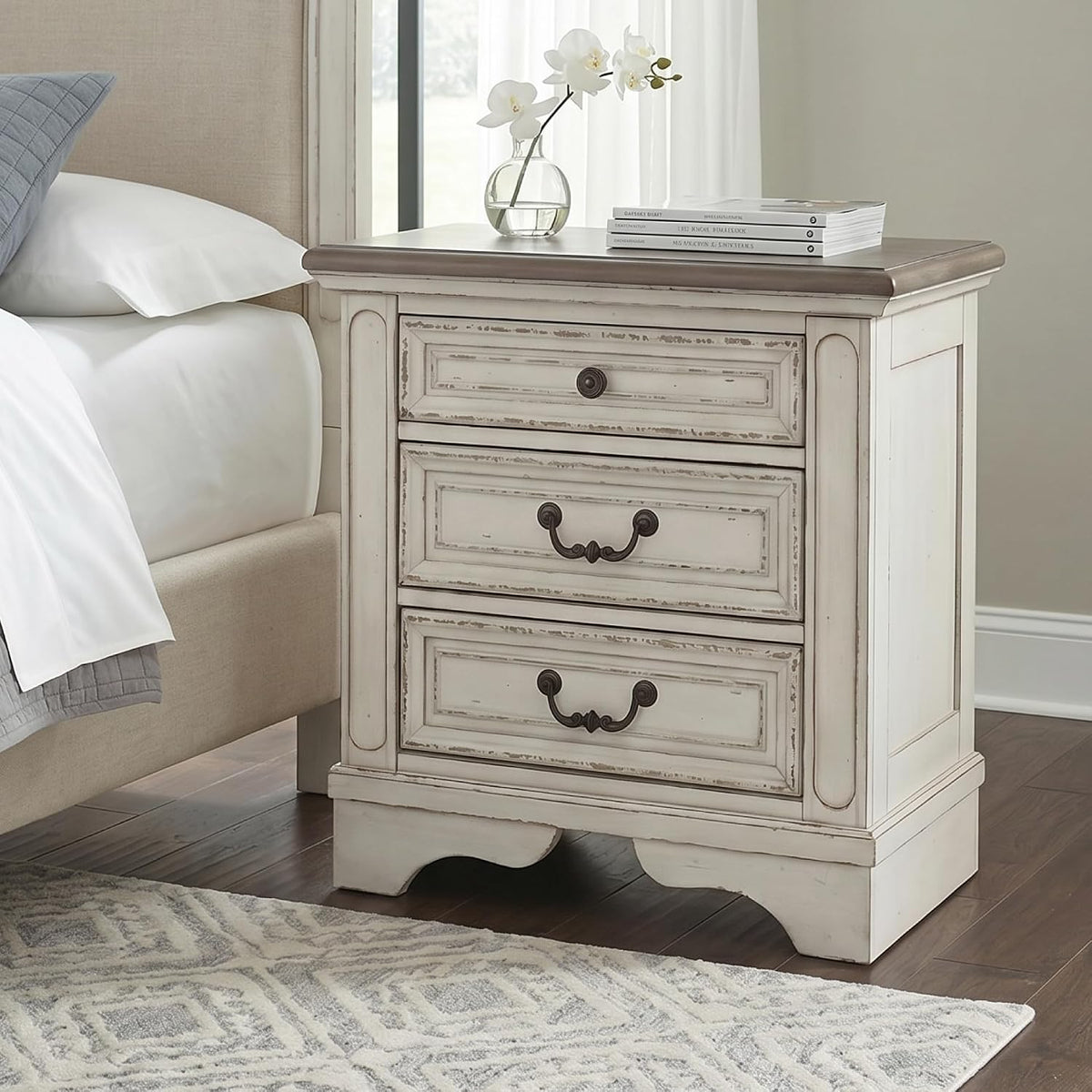 Signature Design by Ashley 3 Drawer Nightstand with Charging Station | Charming vintage two-tone finish, Built-in power strip with 108 in cord, Elegant cast resin corbels, Realyn Series