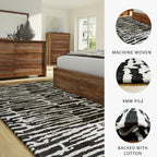 Signature Design by Ashley Bramshaw Area Rug, 8x10, Black and Ivory | Plush 9 mm medium-pile polyester, Protective woven cotton backing, Contemporary high-contrast pattern