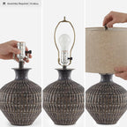 Signature Design by Ashley Magan Metal Table Lamp, 28", Antique Bronze | Antique bronze-tone metal base, Textured pattern, Fabric modified drum shade, Living room or entryway use, 3-way switch