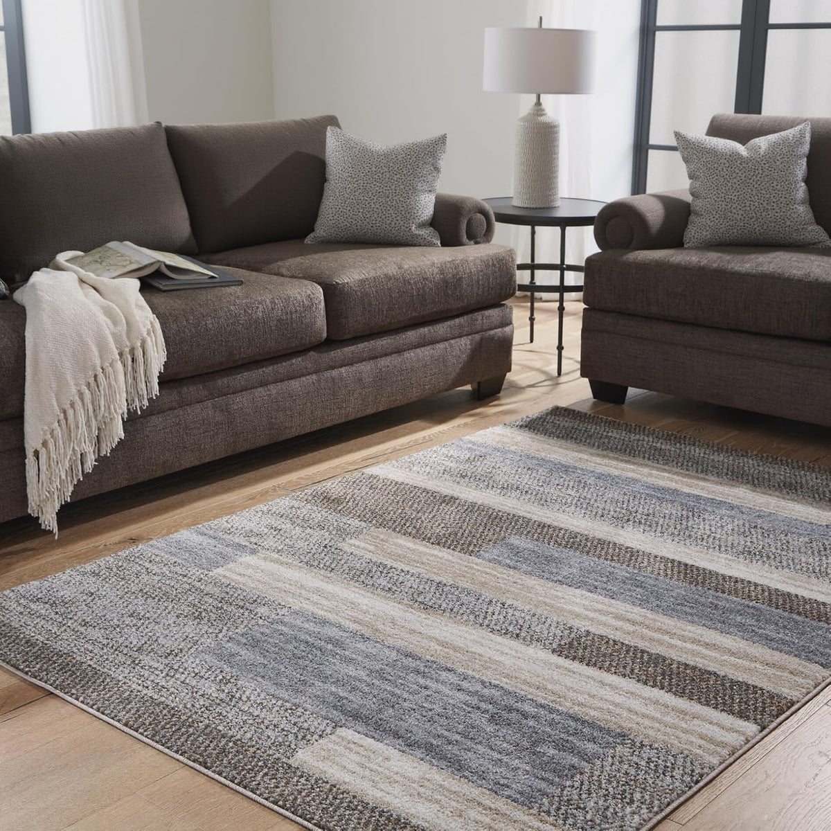Signature Design by Ashley Sethburn Striped Area Rug 5x7, Cream/Gray | Machine-woven 100% polypropylene, Natural jute backing, Casual modern style, Indoor living spaces, Bedrooms
