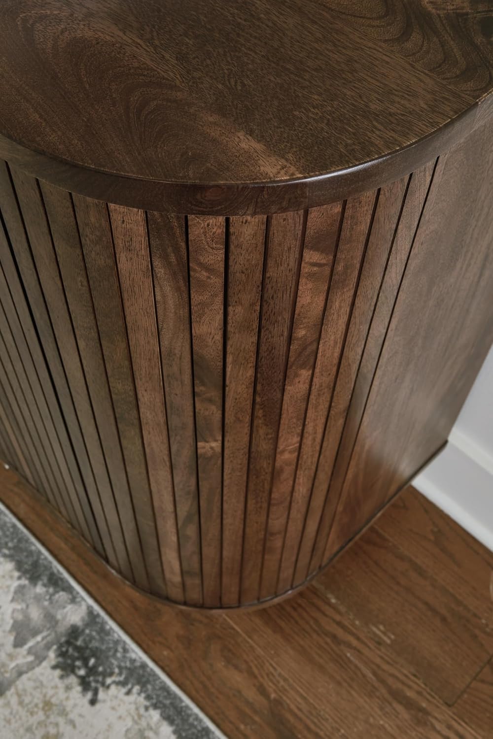 Signature Design by Ashley Mango Wood Accent Cabinet with Doors, Sideboard | Heavyweight construction in rich dark brown, Elegant vertical fluting, Curved sides, Wire management, Amickly Series