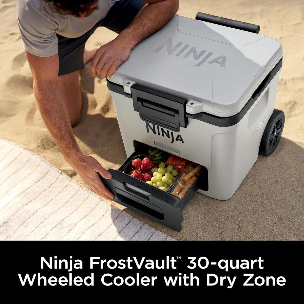 Ninja FrostVault 30qt Cooler with Wheels, Dry Storage Drawer, Cloud White | Ninja FrostVault's 30-qt capacity holds 48 cans, keeps food cool & dry, and rolls easily on all-terrain wheels