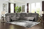 Signature Design by Ashley Power Reclining Loveseat Sofa with Console | Faux leather look, 15-minute assembly, Water-resistant DuraPella fabric, Zero-gravity reclining, Adjustable headrest