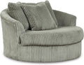 Signature Design by Ashley Lindyn Oversized Round Swivel Accent Chair, Fog | Plush textured cord upholstery, Sag-resistant platform foundation, Reversible seat cushion, No assembly required