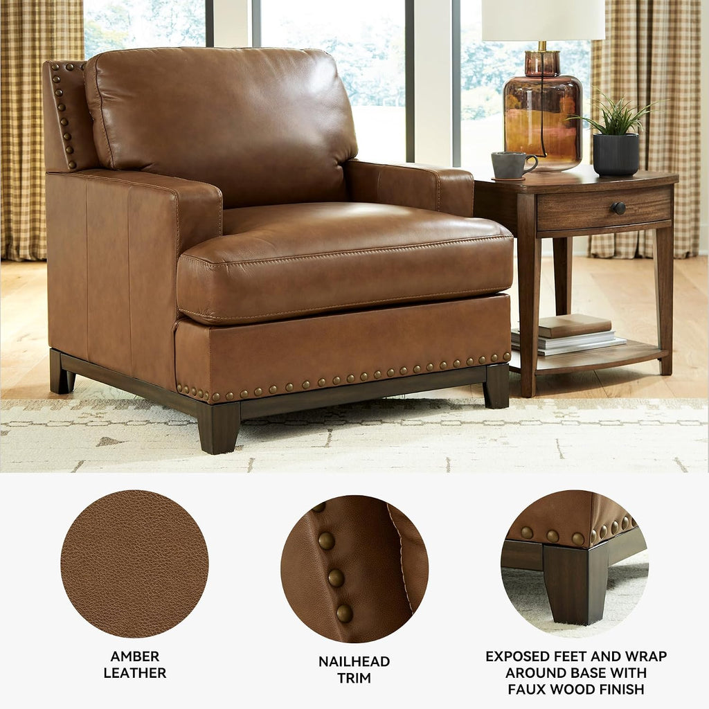 Signature Design by Ashley Oversized Brown Leather Accent Chair, Amber | Genuine and faux leather with brass-tone nailhead trim, Faux wood base, No assembly living room chairs, Brendola Series