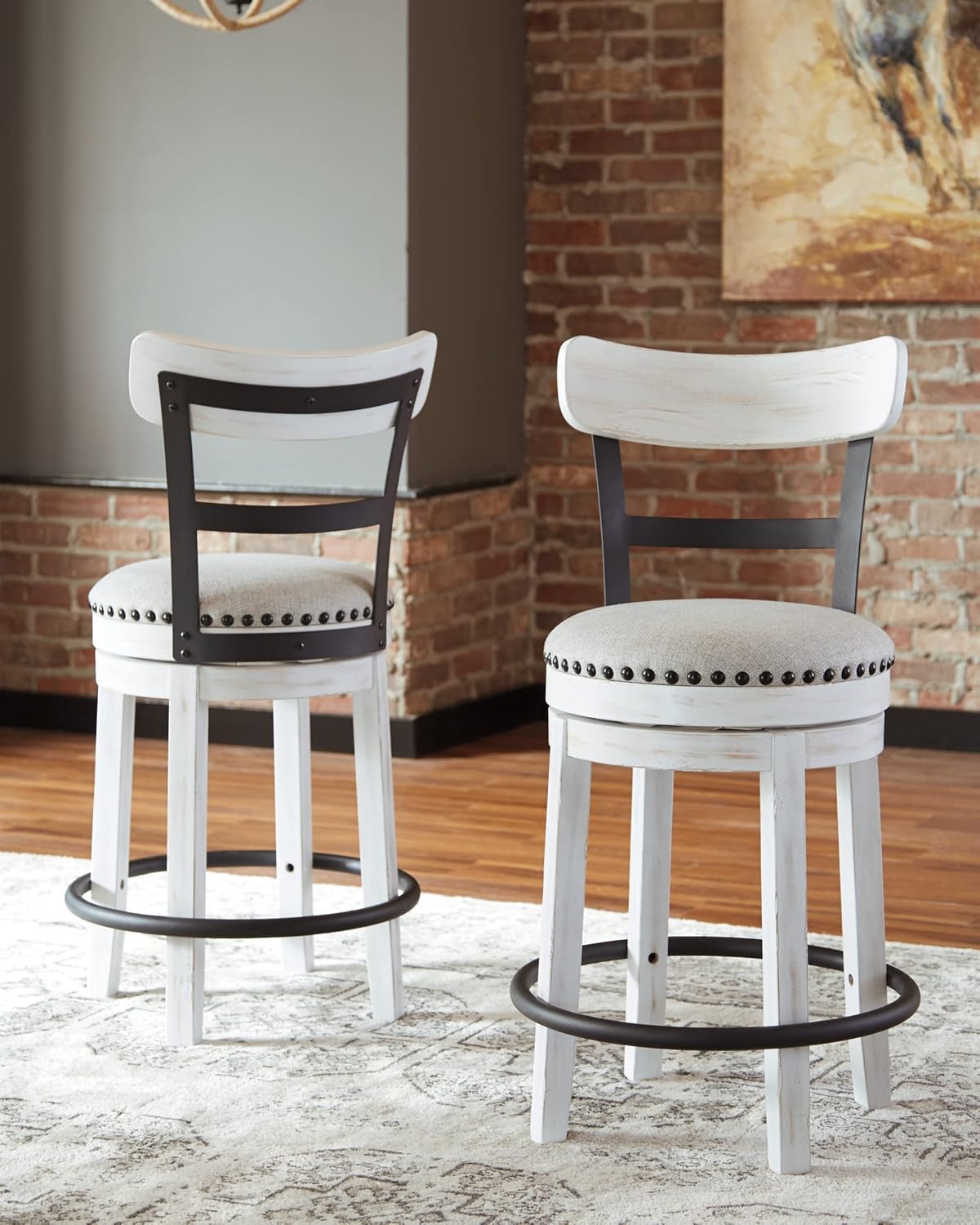 Signature Design by Ashley Valebeck Swivel Counter Height Bar Stool, White | Sturdy 24.5-inch seat with nailhead trim, Farmhouse rustic style featuring linen colored polyester, Smooth 360° rotation