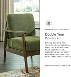 Signature Design by Ashley Bixler Showood Accent Chair, Olive Green | Plush chenille blend upholstery, Reversible cushion, Exposed engineered wood frame, Cozy reading nook, Wood accent chair