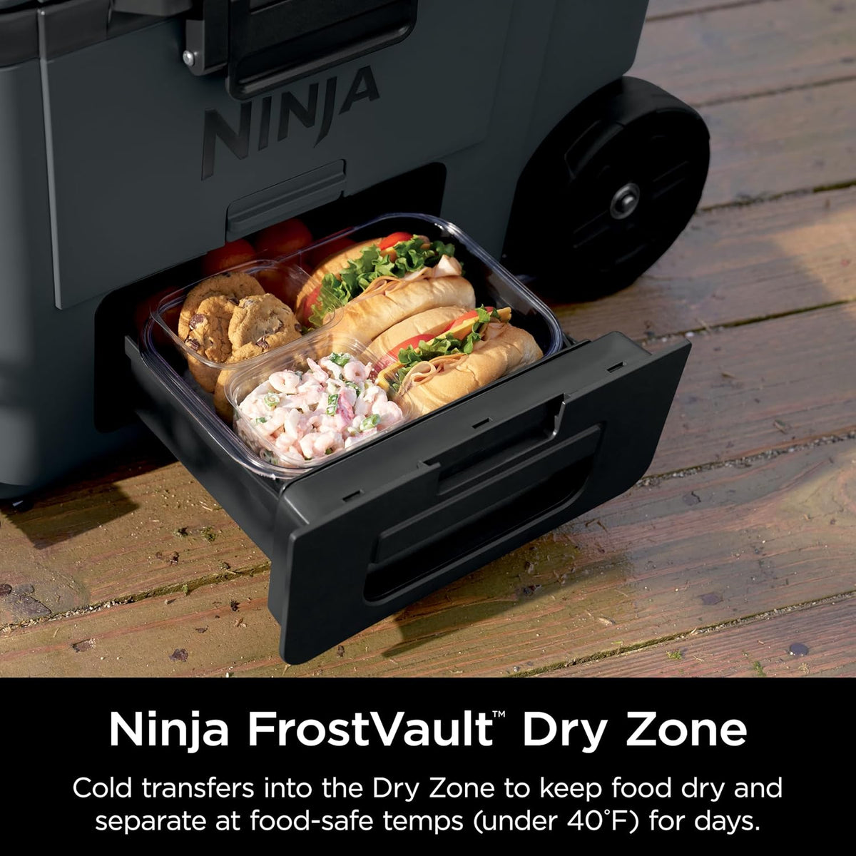 Ninja FrostVault™ 45qt Cooler with Wheels, Dry Storage, Charcoal Gray | Ninja FrostVault's 45-qt capacity holds 68 cans, keeps food cool & dry, and rolls easily on all-terrain wheels