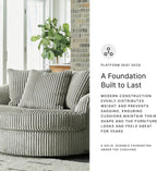 Signature Design by Ashley Lindyn Oversized Round Swivel Accent Chair, Fog | Plush textured cord upholstery, Sag-resistant platform foundation, Reversible seat cushion, No assembly required