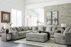 Signature Design by Ashley Lindyn Oversized Round Swivel Accent Chair, Fog | Plush textured cord upholstery, Sag-resistant platform foundation, Reversible seat cushion, No assembly required