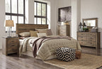 Signature Design by Ashley Trinell King Panel Headboard, Brown | Engineered wood panel, Rustic plank finish, Authentic touch texture, Nailhead accents, 5 minute assembly
